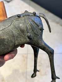 A Vietnamese bronze brush washer on stand and a Chinese bronze warrior on horseback, 19th C.