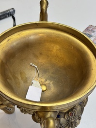 A large Chinese precious stone-inlaid gilt bronze 'elephant' tripod censer and cover on wooden stand, 19th C.