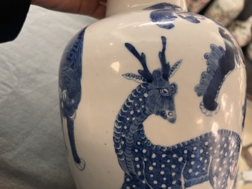 A Chinese blue and white 'mythical animals' vase, Kangxi mark, 19/20th C.