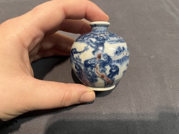 A Chinese blue, white and copper-red 'monkeys' snuff bottle, Yongzheng mark, 19th C.