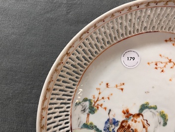 A Chinese famille rose 'mandarin subject' dish with a reticulated border, Qianlong