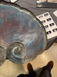 A large Chinese cloisonn&eacute; ruyi-shaped plaque with antiquities, 19/20th C.