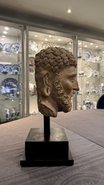 A large terracotta head of a bearded man, Gandhara region, Kushan period, 4/5th C.