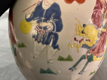 A Chinese famille rose 'Qi Lin Song Zi 麒麟送子' jar and wooden cover, Qianlong/Jiaqing