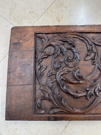 A carved walnut panel depicting the victory of good over evil, 16th C.