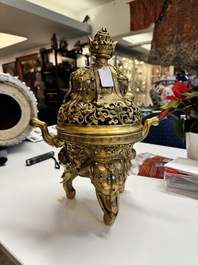 A large Chinese precious stone-inlaid gilt bronze 'elephant' tripod censer and cover on wooden stand, 19th C.