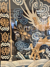 A Chinese embroidered silk tapestry with a five-clawed dragon among clouds and bajixiang, 18/19th C.