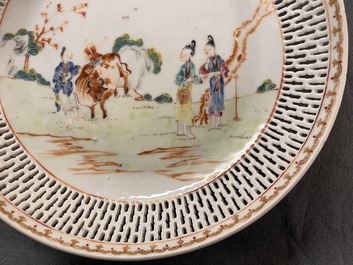 A Chinese famille rose 'mandarin subject' dish with a reticulated border, Qianlong