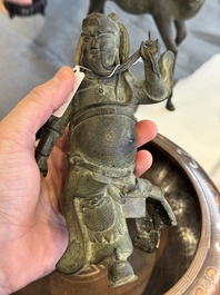 A Vietnamese bronze brush washer on stand and a Chinese bronze warrior on horseback, 19th C.
