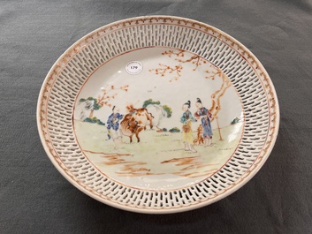 A Chinese famille rose 'mandarin subject' dish with a reticulated border, Qianlong