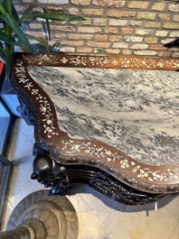 A finely carved Chinese hongmu console table with marble top and mother-of-pearl inlay, Canton, 19th C.