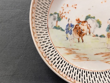 A Chinese famille rose 'mandarin subject' dish with a reticulated border, Qianlong