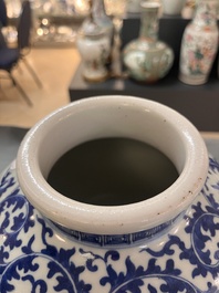 A Chinese blue and white globular 'landscape' vase, 19th C.