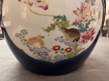 A fine Chinese blue-ground famille rose 'quails and peonies' jar and wooden cover, Qianlong