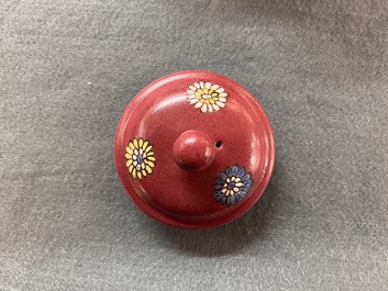 A Chinese famille rose ruby-ground 'landscape scroll' teapot, Yongzheng