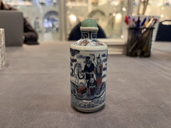 A Chinese blue, white and copper-red 'Journey to the West' snuff bottle, Yongzheng mark, 19th C.