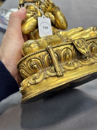 A Sino-Tibetan gilt bronze Virūpa, 19th C.