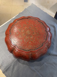 A Chinese red lacquer box and cover with floral design, 19/20th C.