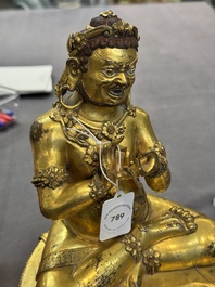 A Sino-Tibetan gilt bronze Virūpa, 19th C.