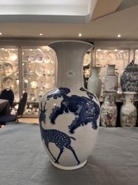 A Chinese blue and white 'mythical animals' vase, Kangxi mark, 19/20th C.