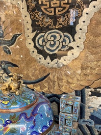 A Chinese embroidered silk tapestry with a five-clawed dragon among clouds and bajixiang, 18/19th C.