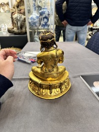 A Sino-Tibetan gilt bronze Virūpa, 19th C.