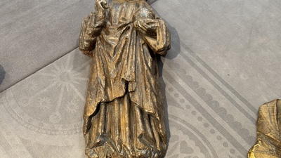 Two carved oak reliefs of Christ and one of Saint Mark, 15/16th C.