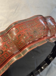 A Chinese red lacquer box and cover with floral design, 19/20th C.