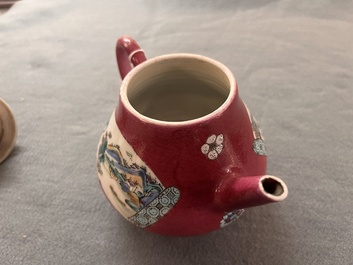 A Chinese famille rose ruby-ground 'landscape scroll' teapot, Yongzheng