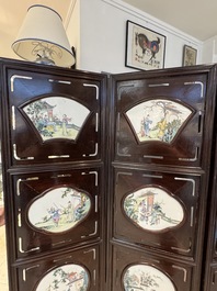 A Chinese four-fold wooden room divider with famille rose 'Romance of the Western Chamber' plaques, Republic