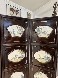 A Chinese four-fold wooden room divider with famille rose 'Romance of the Western Chamber' plaques, Republic