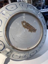 A large Chinese blue and white 'kraak' dish with birds among flowering branches, Wanli