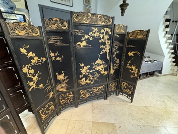 A Chinese gilt-lacquered wooden five-panel folding screen with birds and dragons, 19th C.