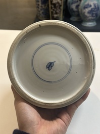 A Chinese blue and white 'Mongolian hunt' vase and cover, Kangxi
