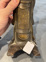 A Chinese bronze figure of an official, Ming