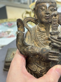 A pair of fine Chinese gilt bronze heavenly kings on stand, Ming