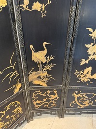 A Chinese gilt-lacquered wooden five-panel folding screen with birds and dragons, 19th C.