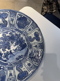 A large Chinese blue and white 'kraak' dish with birds among flowering branches, Wanli
