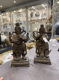 A pair of fine Chinese gilt bronze heavenly kings on stand, Ming