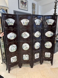 A Chinese four-fold wooden room divider with famille rose 'Romance of the Western Chamber' plaques, Republic