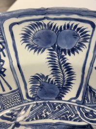 A large Chinese blue and white 'kraak' dish with birds among flowering branches, Wanli