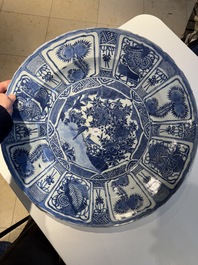 A large Chinese blue and white 'kraak' dish with birds among flowering branches, Wanli