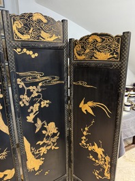 A Chinese gilt-lacquered wooden five-panel folding screen with birds and dragons, 19th C.