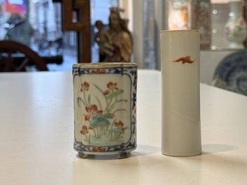 A pair of Chinese famille rose plaques, two brush pots, a saucer and a covered box, Qianlong mark, 18/19th C.