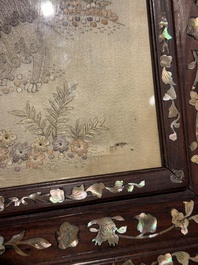 A Chinese mother-of-pearl-inlaid wooden table screen with silk embroidery, Canton, 19th C.