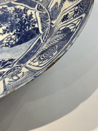 A large Chinese blue and white 'kraak' dish with birds among flowering branches, Wanli