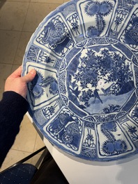 A large Chinese blue and white 'kraak' dish with birds among flowering branches, Wanli