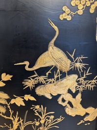 A Chinese gilt-lacquered wooden five-panel folding screen with birds and dragons, 19th C.