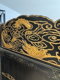 A Chinese gilt-lacquered wooden five-panel folding screen with birds and dragons, 19th C.