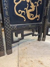 A Chinese gilt-lacquered wooden five-panel folding screen with birds and dragons, 19th C.